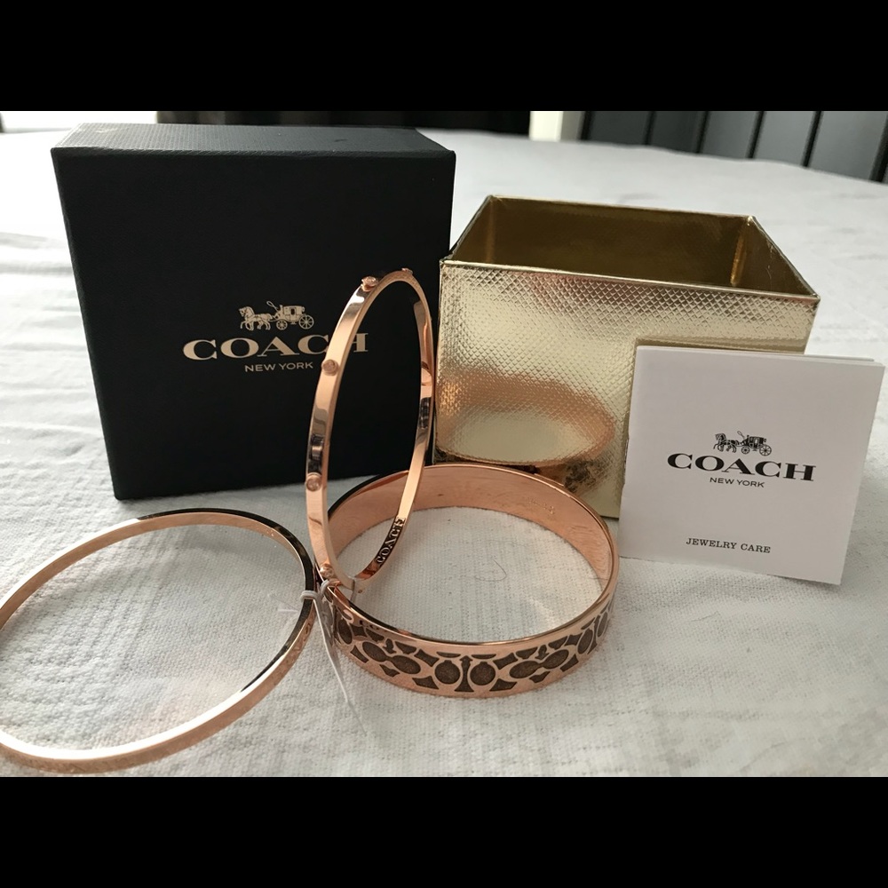 Set of three rose gold Coach bracelets